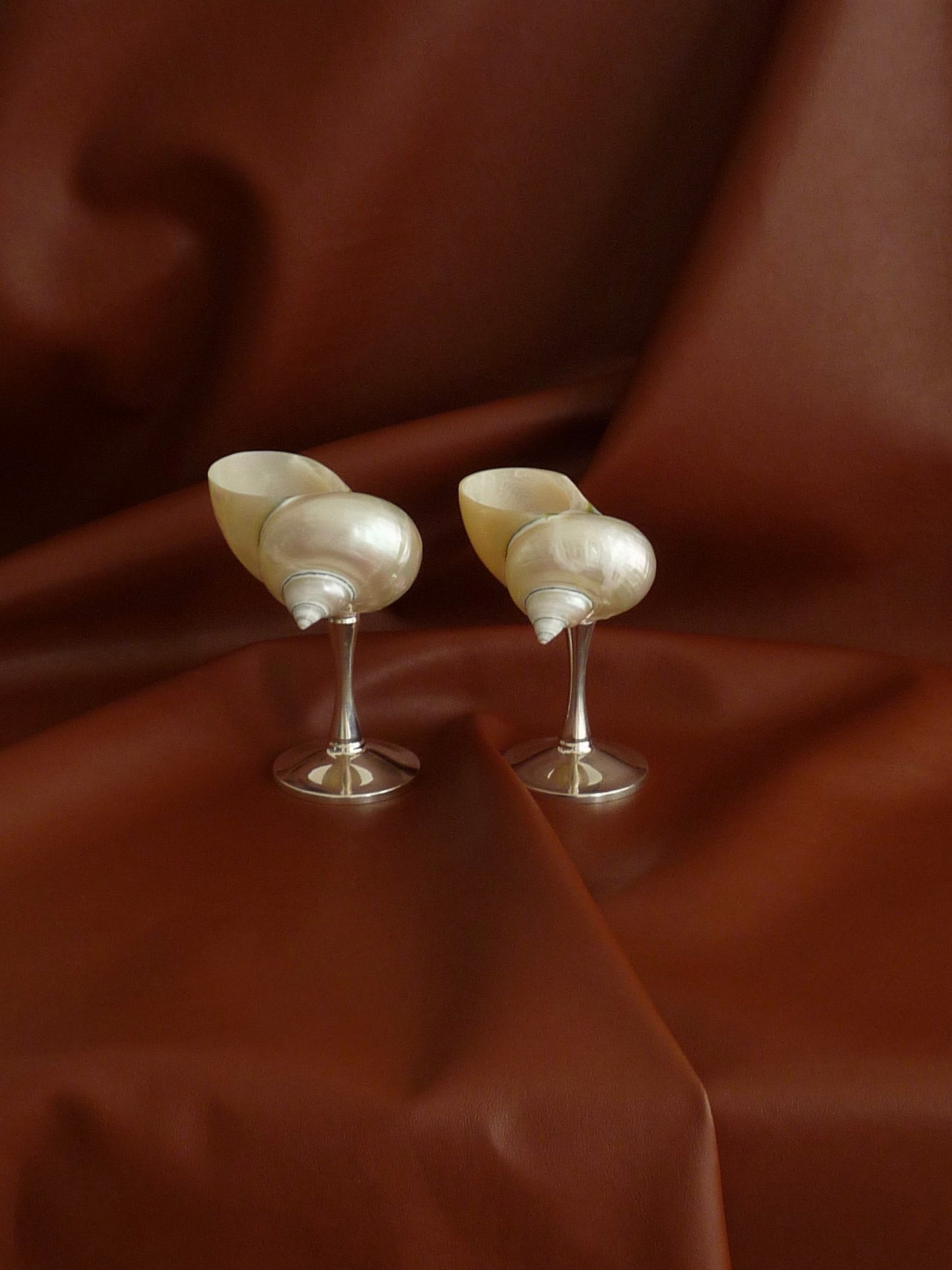 Curly shell glass with silver plated stem