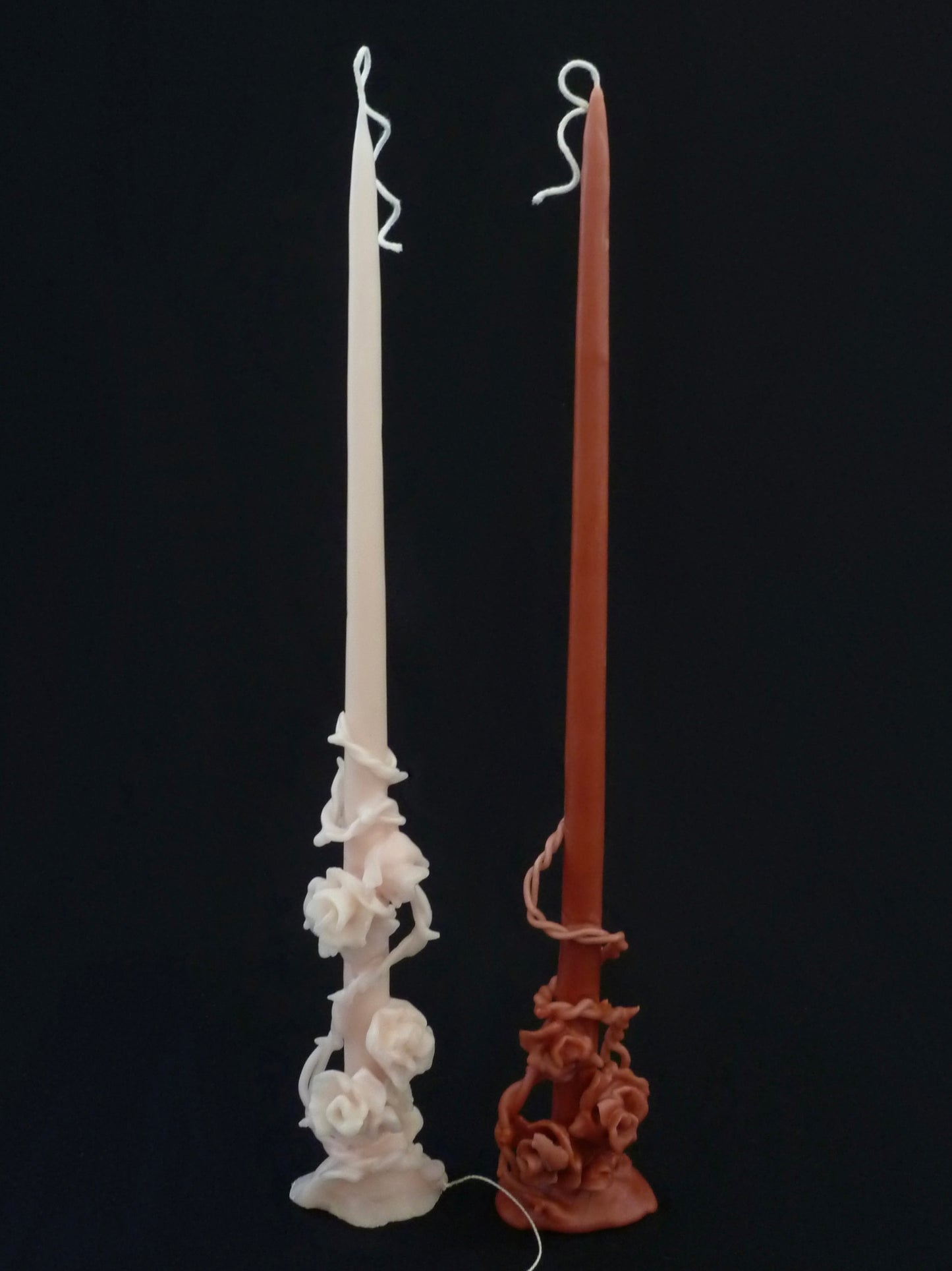 Сandle entwined with rose