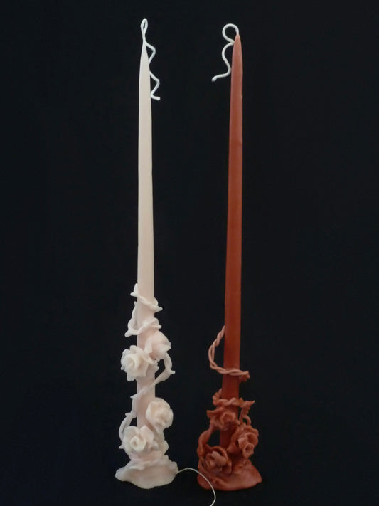 Сandle entwined with rose